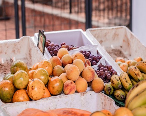 Fresh fruits and vegetables displayed at a local Colombian market